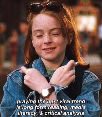 A contented person clutches their phone while praying for long-form reading to go viral—a meme for media literacy advocates caught between hope and resignation.