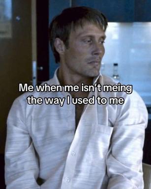 Contemplative man in blue light: "Me when me isn't meing the way I used to me" — identity alienation via recursive self-reference.