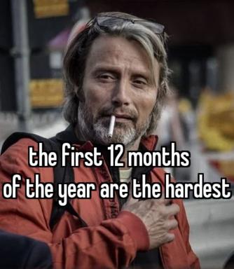 A man in a red jacket on a city street with a cigarette, captioned with a deadpan joke about the year being uniformly difficult.