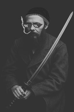 Historical portrait (likely a Russian writer) digitally edited with pixel sunglasses and sword, mocking the "studied the blade" dedication trope. Subversion of the serious-literature-is-dead discourse via absurdist visual humor.