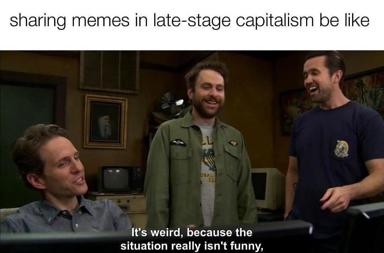 A character in a sitcom scene jokes that sharing memes under late-stage capitalism doesn't work, then deflates the joke by admitting the situation isn't funny at all—meta comedy about failure to be funny.