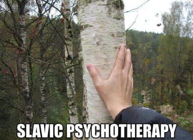Hand on birch tree in Eastern European forest with deadpan caption—touching nature as therapy.