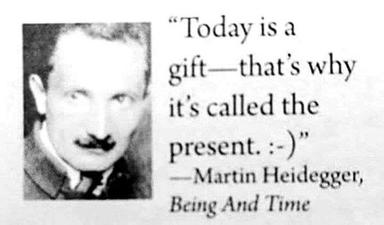 Martin Heidegger wordplay meme: "Today is a gift — that's why it's called the present." Dry philosophical humor via homophone.