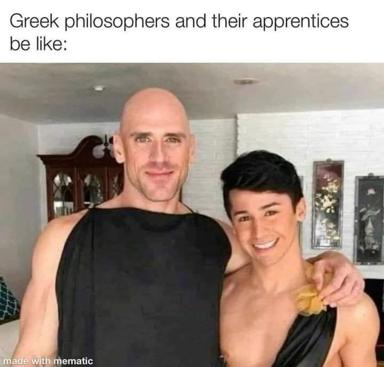 Two men (older and younger) pose shirtless indoors; caption jokes about Greek philosophers and their apprentices, implying physical/idealized male-mentor dynamics