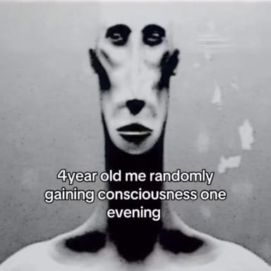 A surreal black-and-white face with hollow eyes and stark features, captioned about sudden childhood consciousness — existential and deadpan.