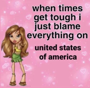 A stylised cartoon woman in a green skirt and yellow necklace stands on a pink background scattered with translucent hearts, with text about blaming "everything on united states of america" when times are tough.